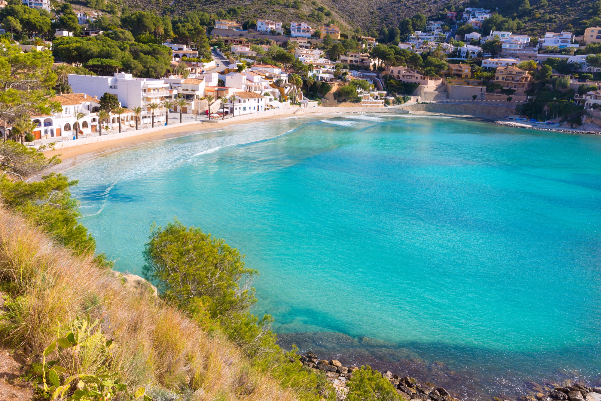 A secluded turquoise cove on the Northern Costa Blanca
