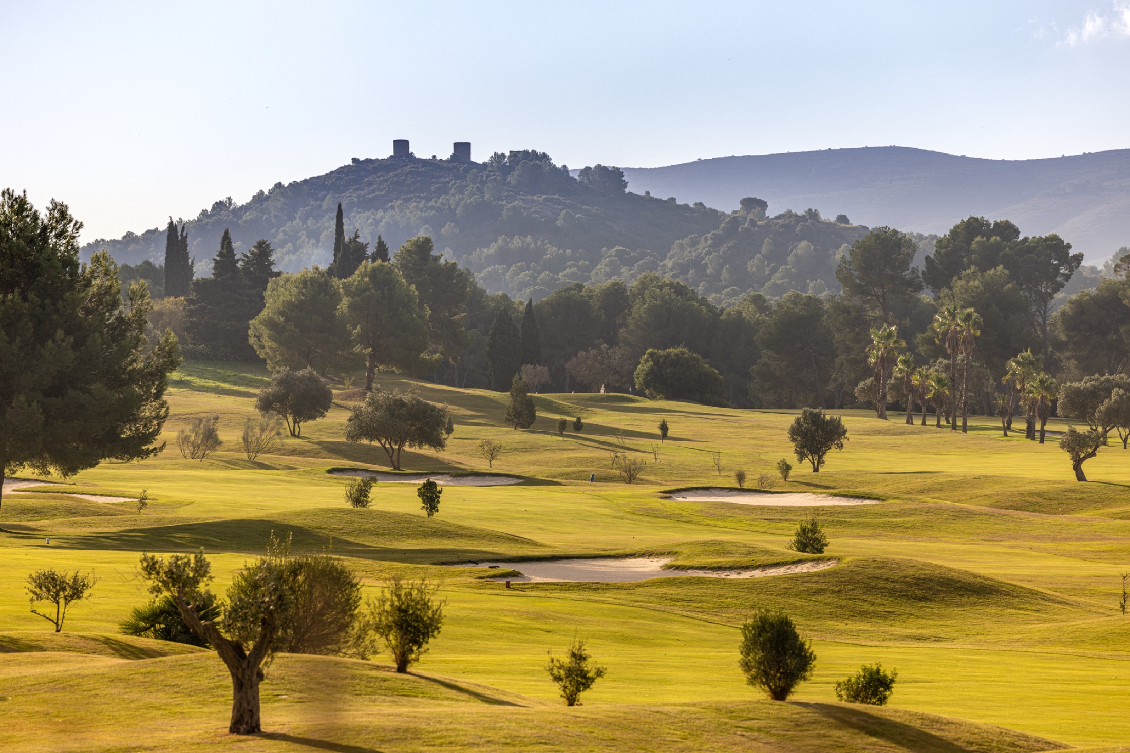 La Sella Golf fairways set among Mediterranean trees and hills